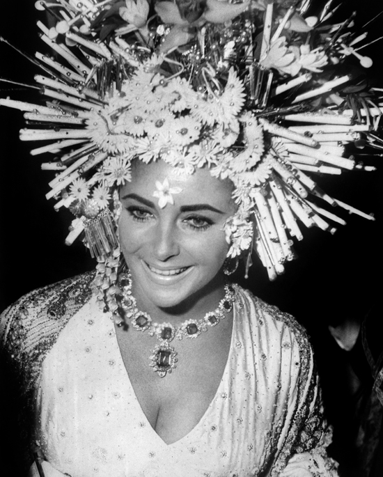 Elizabeth Taylor wears Bulgari jewellery at the masked ball, Hotel Ca'Rezzonico, Venice