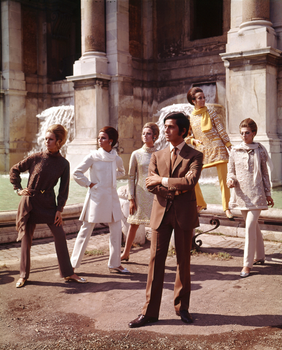 Valentino posing with models nearby Trevi Fountain, Rome
